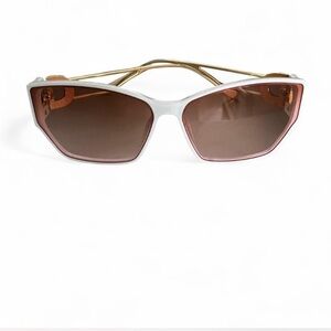 Chic White and Pink Sunglasses dress up your favorite outfit with a statement